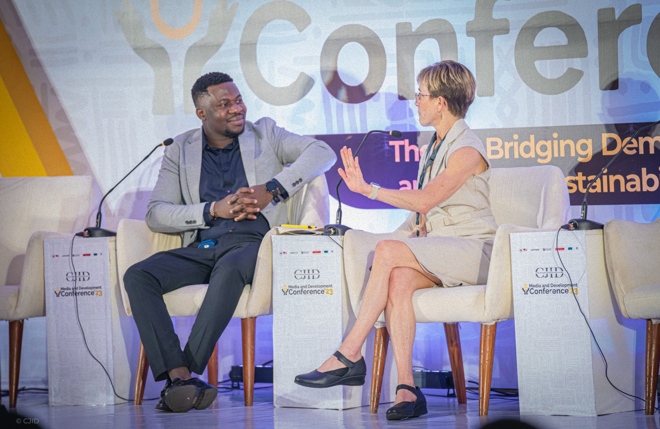 Amy Mitchell speaking at event.